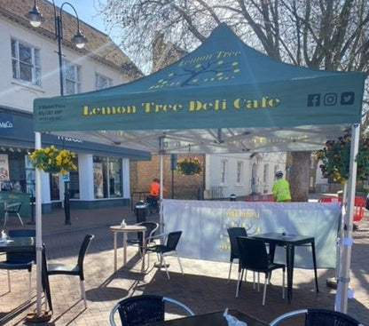 Branded gazebo with printed half walls